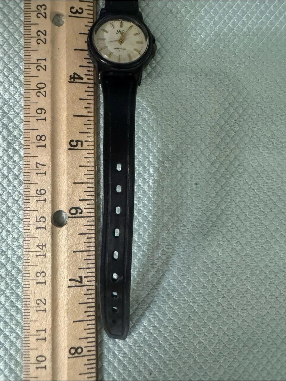 Q&Q Black and Gold Analog Quartz Watch for Everyday Wear